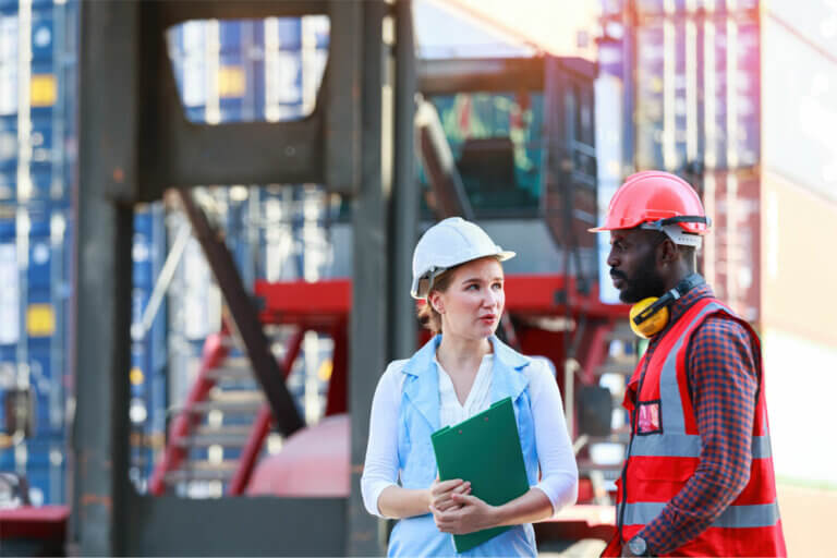 Female and Male Employee Working On Supply Chain